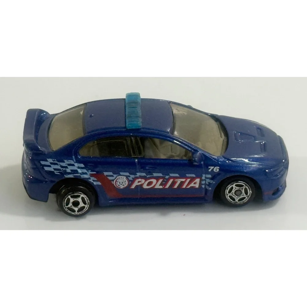MATCHBOX 2010 BLUE MITSUBISHI EVOLUTION X POLICE 1:62 DIE-CAST TOY CAR MATTEL‎